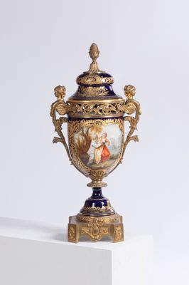 a vase that is sitting on a pedestal on a white surface