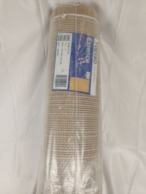 a close up of a roll of cloth on a white surface