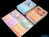 several cards are stacked on top of each other on a black background