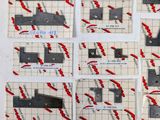 several pieces of paper with red and black designs on them