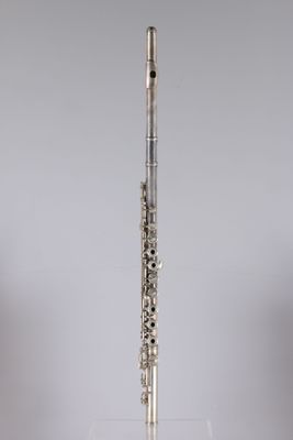 an image of a flute that is on a stand