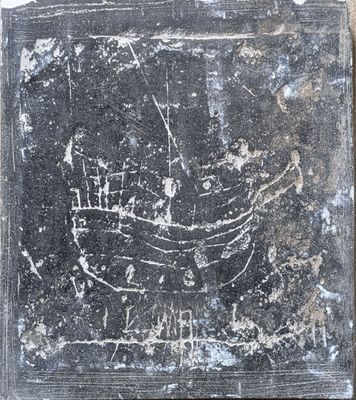 a picture of a rock with a drawing on it