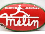 an image of a red and green sign with a baseball player on it