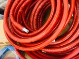 a lot of hoses that are sitting on a box