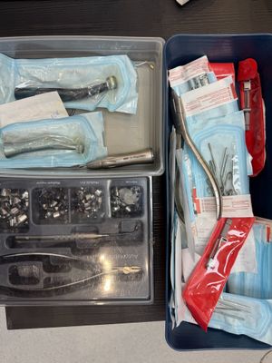 many items in a plastic container on a table