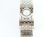 an image of a lady ' s gucci watch sitting on a white surface