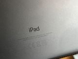 the back side of an ipad with the new ipad logo on it
