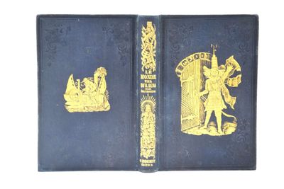 un vieux livre bleu orné d'illustrations dorées représentant un homme et une femme