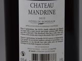 a label on a bottle of wine that says chateau mandrine