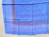 a close up of a piece of blue cloth on a table