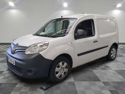 a picture of a white van parked on a checkered floor