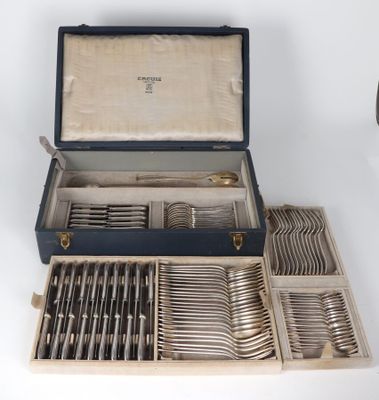 a box with a bunch of silverware in it