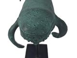 sculpture of a fish on a black stand