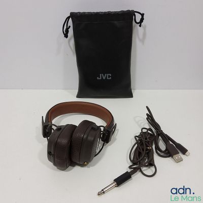 a pair of headphones sitting on a table next to a bag