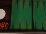 a green backgam board with orange and green backgams
