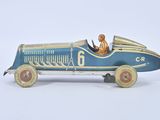a blue toy car with a man in the driver ' s seat