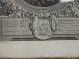 a picture of a portrait of a man on a plaque