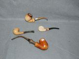 three different types of pipes on the table