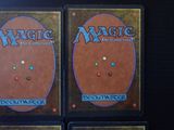 three decks of magic the gathering deck are shown on a table