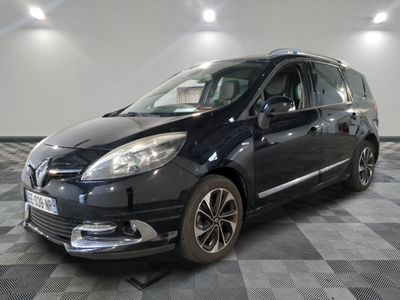 a picture of a black car parked in a garage