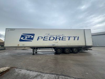a picture of a semi truck parked in a parking lot