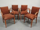 lot de quatre chaises de style « mid-century » avec accoudoirs et coussins rembourrés