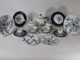 many different types of porcelain dishes and cups and saucers