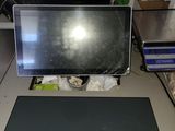 a laptop computer sitting on top of a desk