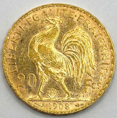 an image of a gold coin with a rooster on it