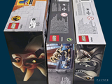 three boxes of legos that are sitting on a table