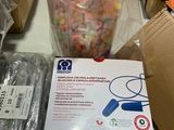 a box of candy and a bag of candy sitting on a table
