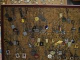 a cork board with a bunch of keys on it