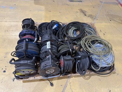 a lot of wires and cords on the floor