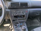 a car dashboard with an electronic device in the center of it