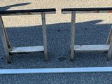 two chairs that are sitting on the ground