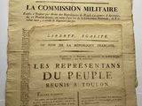 deux morceaux de vieux journal posés l'un sur l'autre