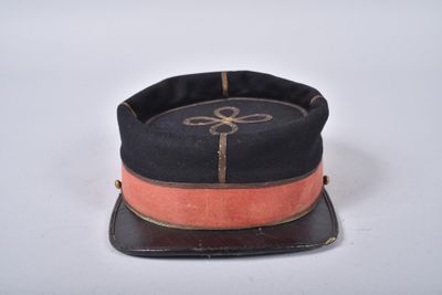a black hat with a pink ribbon on it
