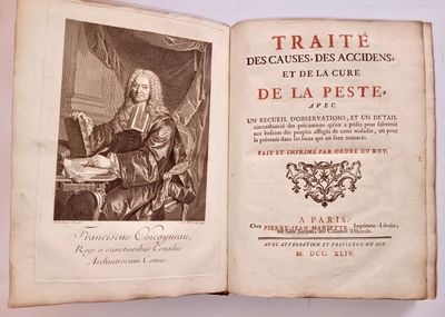 an open book with a picture of a man sitting at a table