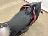 a close up of a motorcycle with a seat on it ' s back