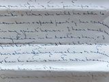 a close up of a piece of paper with writing on it