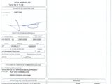 a close up of a document with a picture of a plane on it