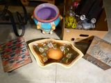 a bowl of soup and a bowl of eggs on the floor
