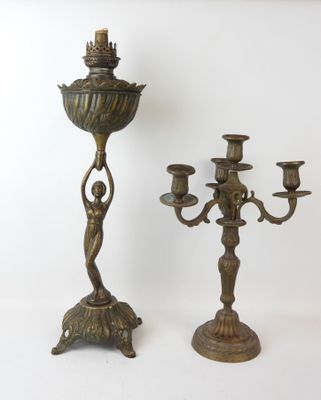 pair of antique brass candelabs with figures on each of them