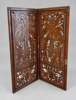 an old wooden screen with carvings and carvings on it