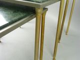 three tables that are sitting on top of each other
