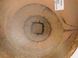 a close up of a plate with a design on it
