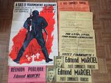 some old movie posters are on a table next to each other