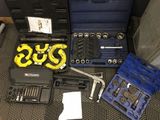 many tools that are sitting on the floor next to each other