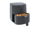 une friteuse à air chaud noire contenant des frites