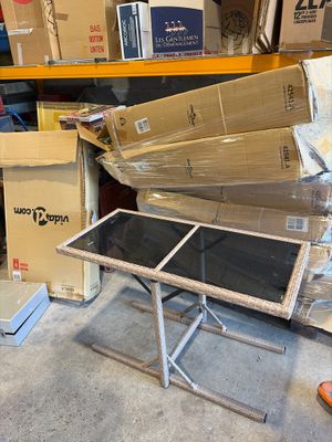a pile of boxes sitting on top of a table